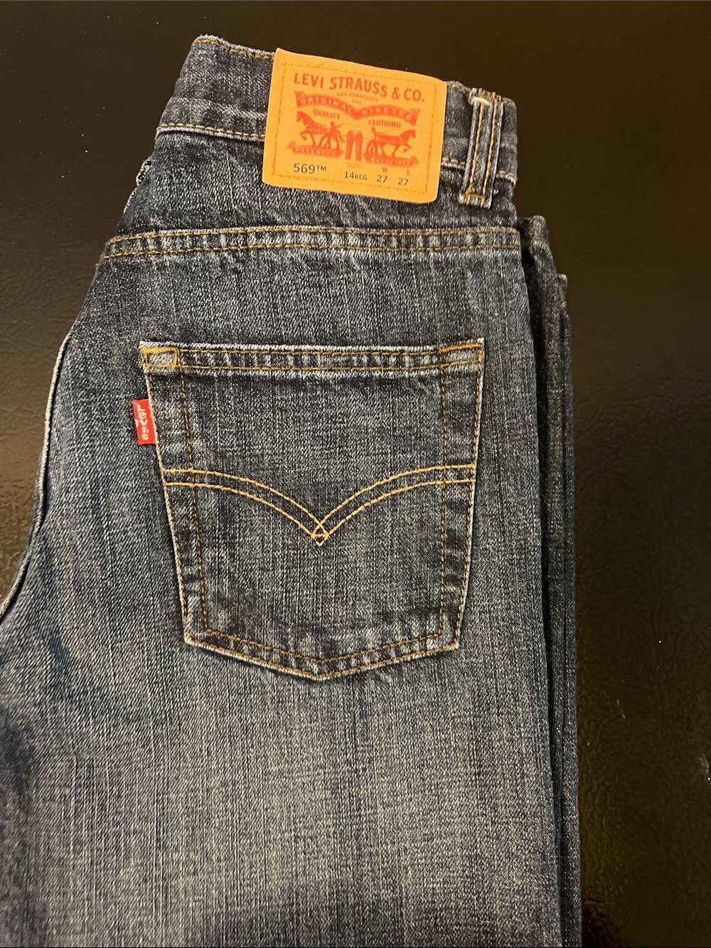 Levi's Men's Bootcut Jeans in Medium Blue Denim